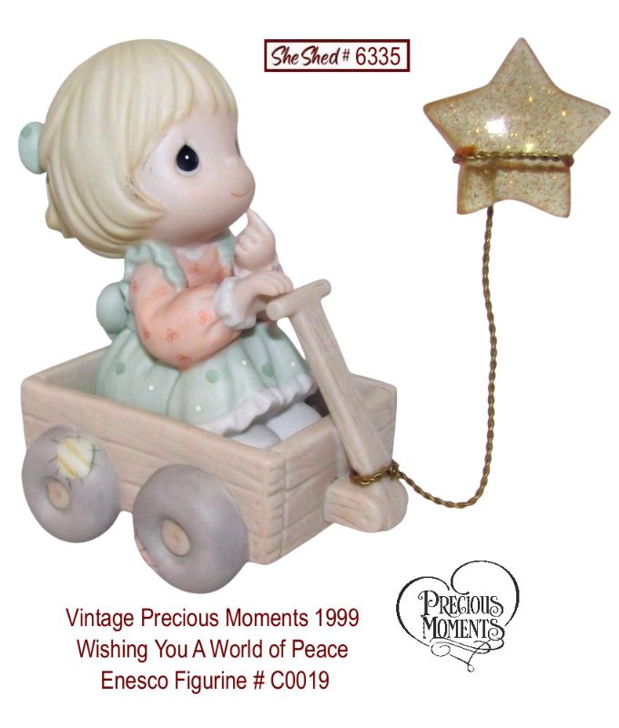 Precious Moments 1999 Wishing You A World of Peace Figurine C0019 Star Symbol